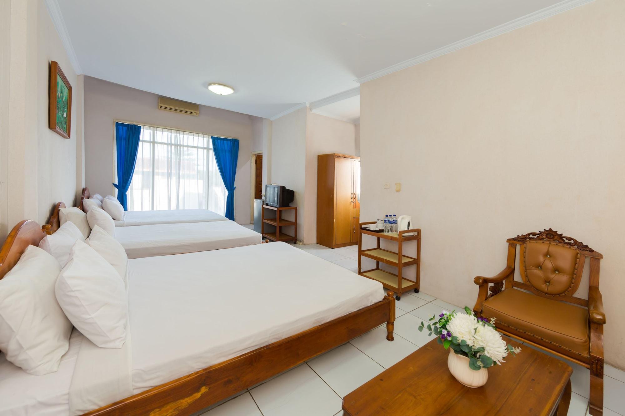 Oyo 3134 Puri Tamu Hotel Джимбаран Экстерьер фото
