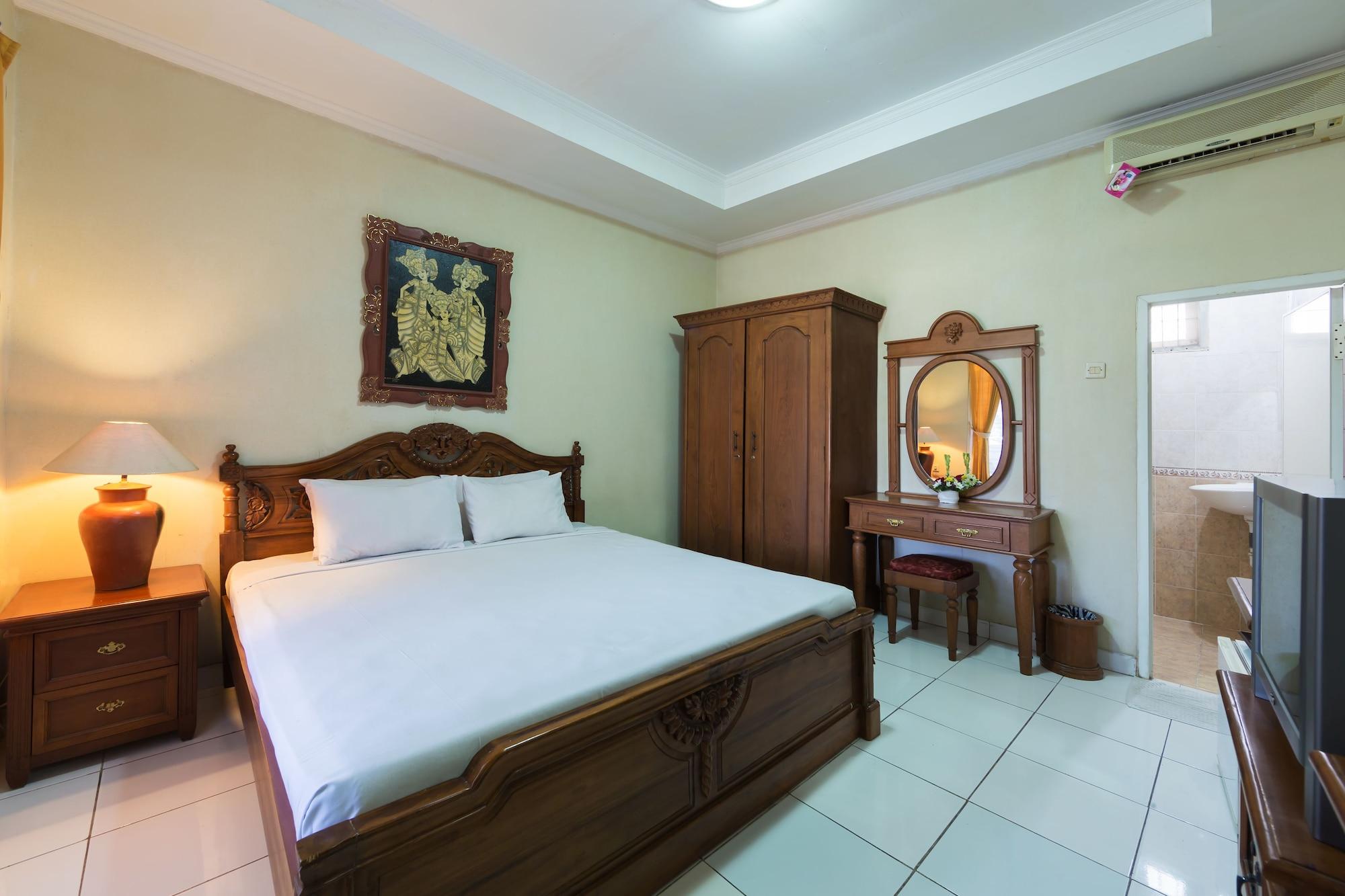 Oyo 3134 Puri Tamu Hotel Джимбаран Экстерьер фото