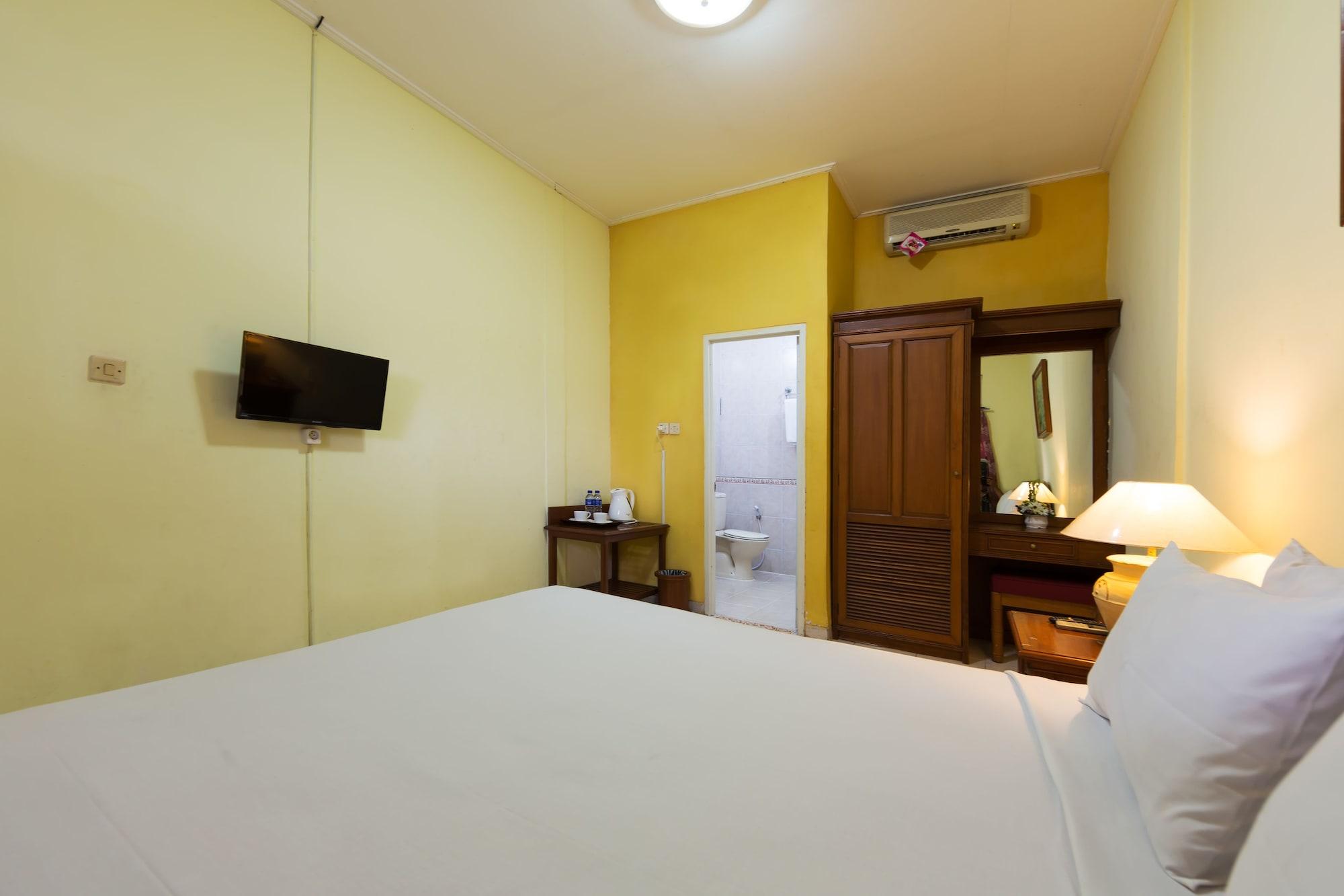 Oyo 3134 Puri Tamu Hotel Джимбаран Экстерьер фото