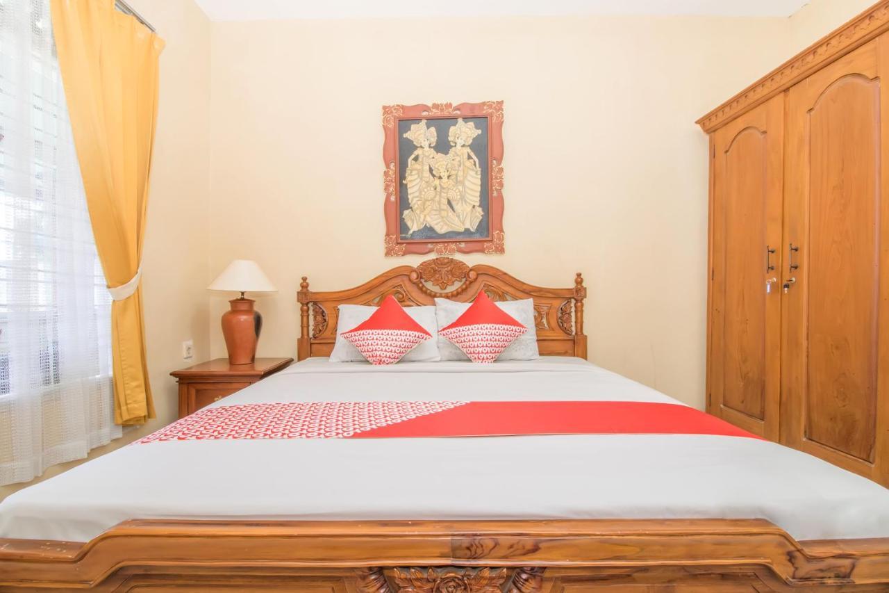Oyo 3134 Puri Tamu Hotel Джимбаран Экстерьер фото