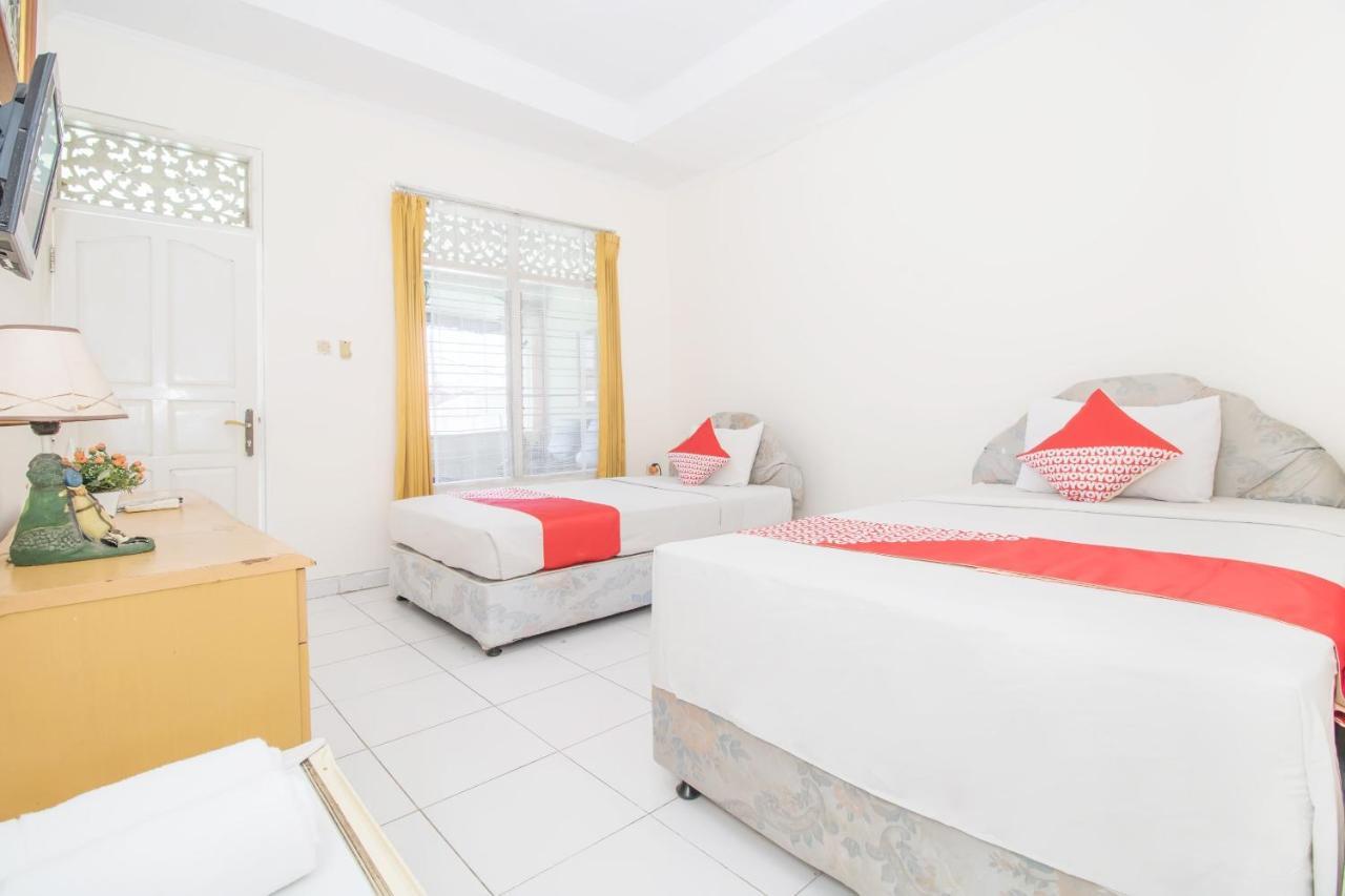 Oyo 3134 Puri Tamu Hotel Джимбаран Экстерьер фото
