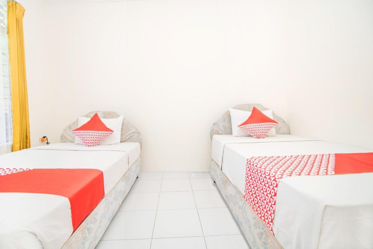Oyo 3134 Puri Tamu Hotel Джимбаран Экстерьер фото